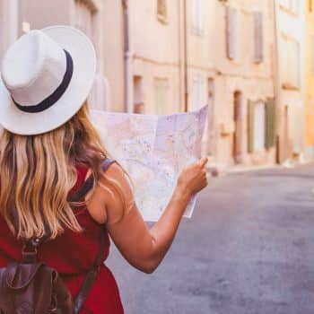 Girl reading map in lesser known getaway