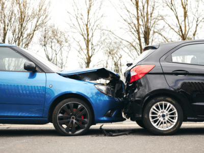 Two cars involved in a rear-end collision, illustrating the importance of having proper commercial insurance coverage for Uber.